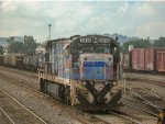 FXE C30-7 Locomotive in the yard with faded paint scheme